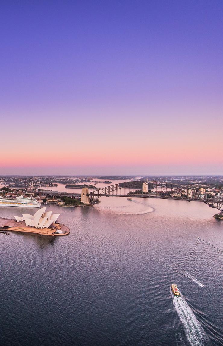 Sydney Harbour aerial with views of Royal Botanic Garden, the CBD, Sydney Opera House and Sydney Harbour Bridge © Destination NSW