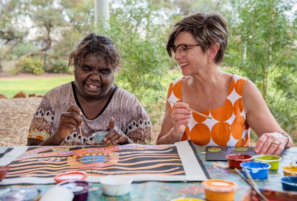 Maruku Arts Dot Painting Workshop, Yulara, Northern Territory © Tourism NT/Shaana McNaught