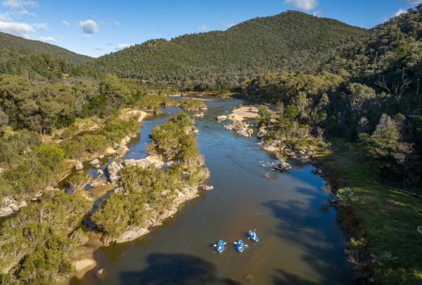 Group kayaking on Snowy River, Kosciuszko National Park, New South Wales © Tourism Australia