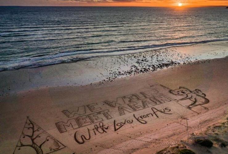 'We will meet again' beach message © Tourism Australia 'We will meet again' beach message © Tourism Australia