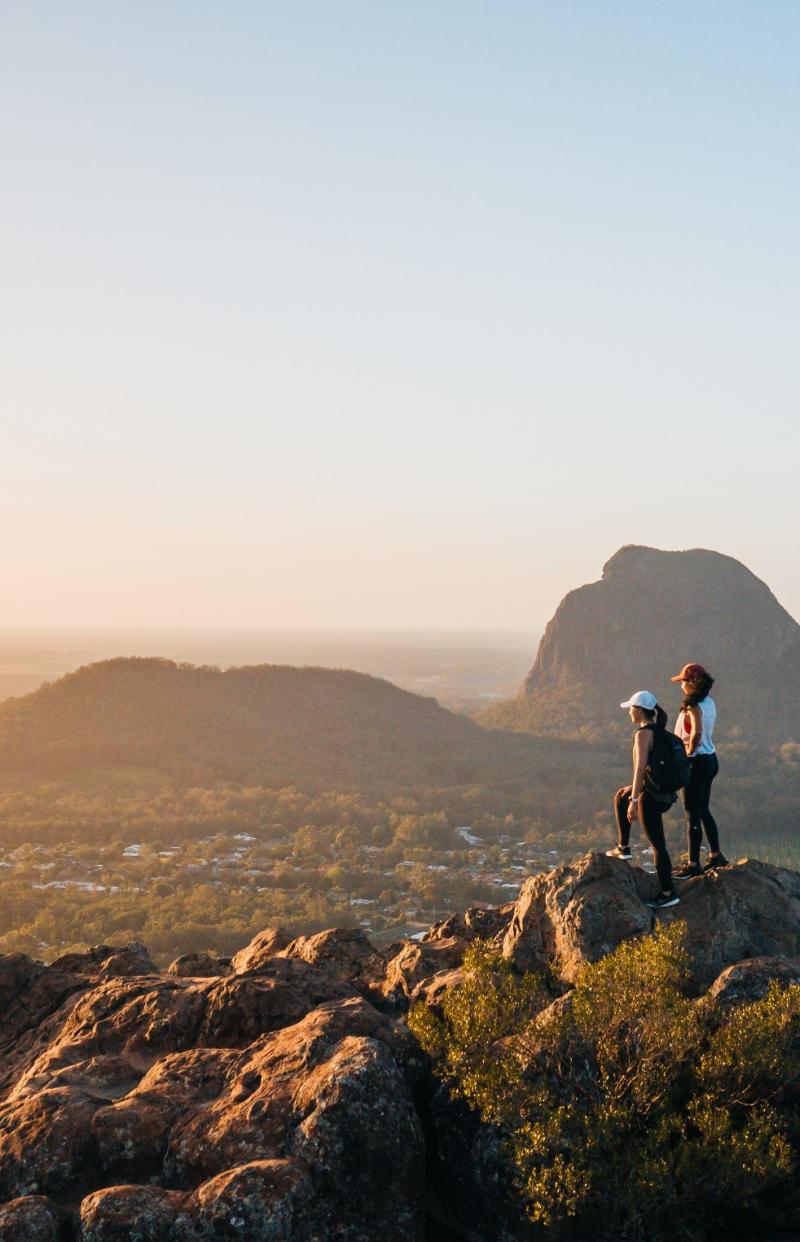 Two friends hiking in Mount Ngungun, Glass House Mountains, Queensland © Tourism and Events Queensland
