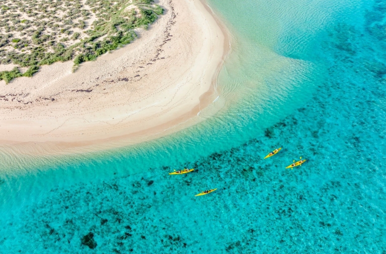 Kayaking with Exmouth Adventure Co. on Ningaloo Reef, Western Australia © Tourism Australia