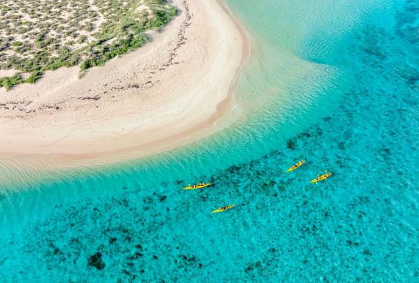 Kayaking with Exmouth Adventure Co. on Ningaloo Reef, Western Australia © Tourism Australia