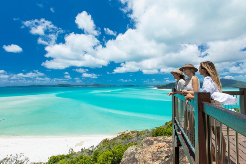 Group of women standing at a lookout overlooking Whitehaven Beach, Whitsundays, Queensland © Tourism and Events Queensland