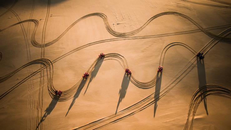 Aerial view of sand dune buggies on Stockton Beach, Port Stephens, New South Wales © Tourism Australia Aerial view of sand dune buggies on Stockton Beach, Port Stephens, New South Wales © Tourism Australia